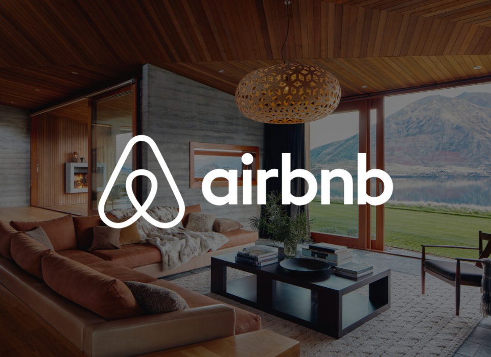 Airbnb logo on a beautiful scenery image